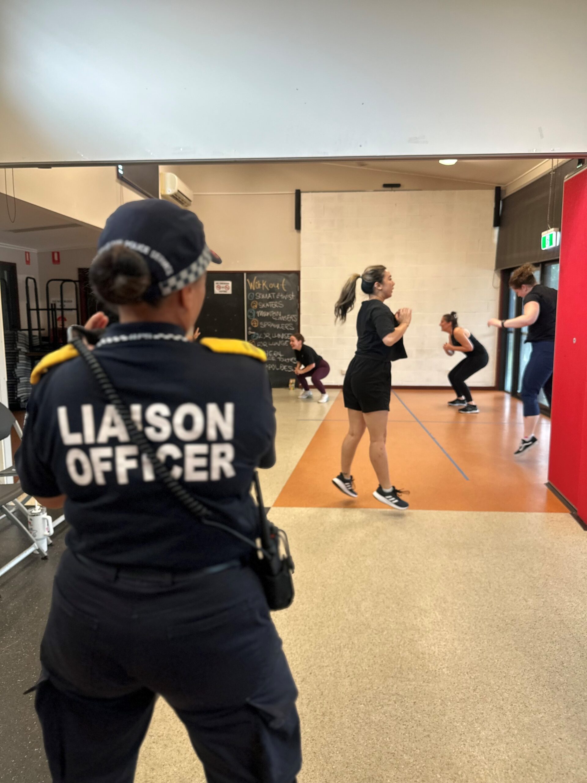Liaison Officer watching RUBY participants exercising