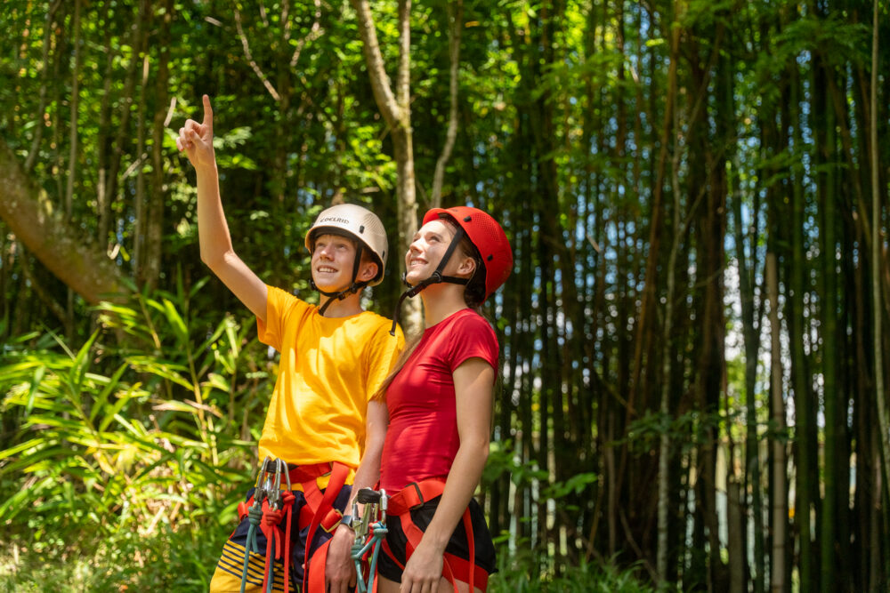 2 PCYC Youth Boys looking up and pointing at the treetops