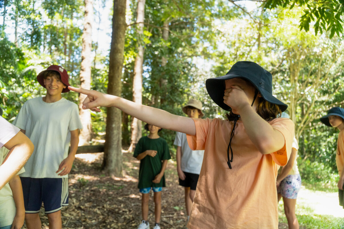 kids pointing to group and playing