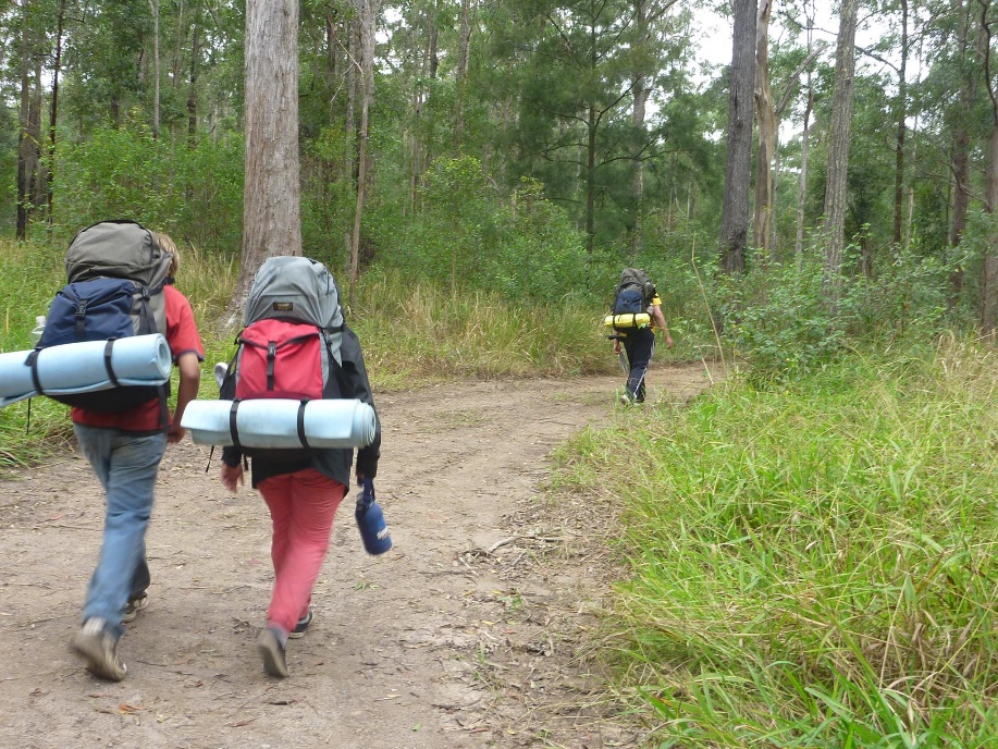 PCYC team hiking through woods