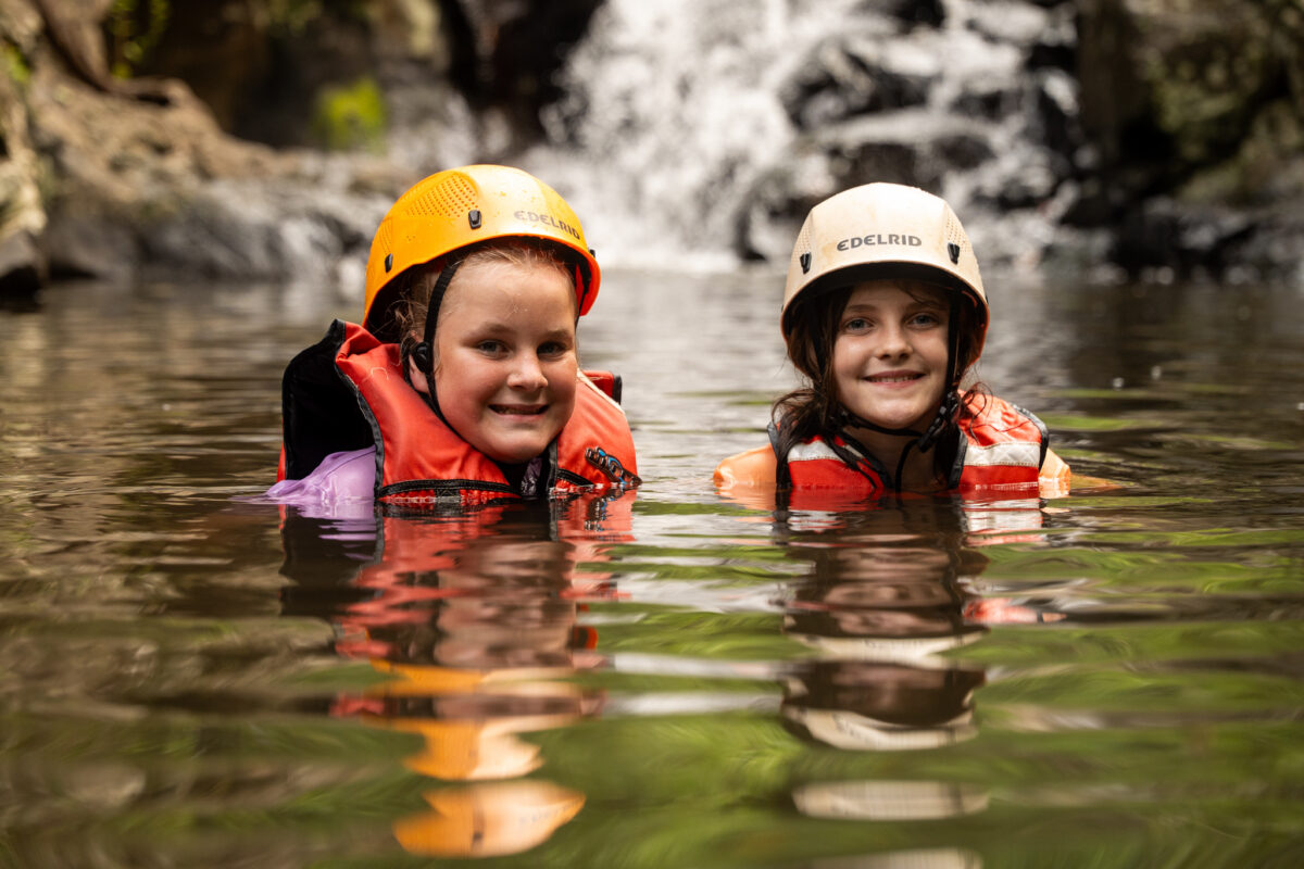 2 PCYC Youth Girls floating in water